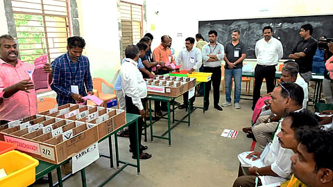 Polling officials at work during the counting of votes for the Thattanchavady Assembly by-election, in Puducherry, Friday, Oct. 9, 2026
