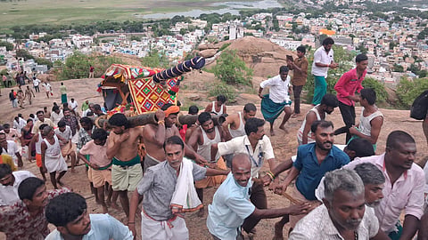 Vel, the sacred spear of Lord Murugan, is being taken from Subramaniyaswami temple in Tirupparankundram to the hilltop, on Friday