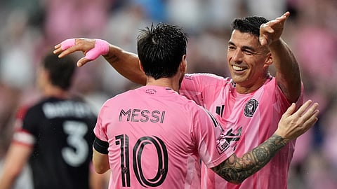 Lionel Messi and Luis Suarez
