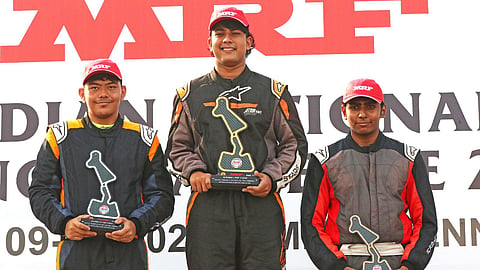 MRF F1600 Race-2 winner Shivansh Bejoy (centre) flanked by Evan Sharwan (left, 2nd) and Gyan S (3rd)