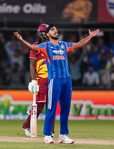 India's Arshdeep Singh celebrates the wicket of West Indies' Sherfane Rutherford during the third T20I cricket match of a series between India and West Indies, in Indore, Madhya Pradesh, Sunday, Oct. 11, 2026