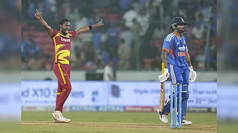 West Indies' Keemo Paul, right, celebrates the wicket of India's Nitish Kumar Reddy during the fourth T20I cricket match of a series between India and West Indies, in Hyderabad, Telangana.