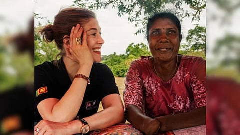 Actress Rosamund Pike with landmine survivor Victoria