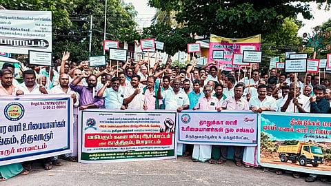 Sand lorry owners and drivers stage protest in Tiruchy on Friday