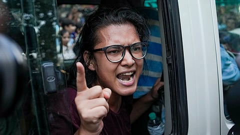 AISA chief Neha Bora speaks to the media after her detention by the police during a protest against Chief Election Commissioner (CEC) Gyanesh Kumar, demanding his resignation over alleged irregularities in the Special Intensive Revision (SIR) of electoral rolls, at Mandi House, in New Delhi, Friday, Oct. 16, 2026