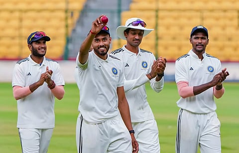 South Zone pacer Vidhwath Kaverappa walks back after impressing on the opening day