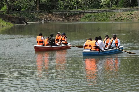 Tenkasi MP Dhanush M Kumar and other tourists take a boat ride after official launch in Courtallam
