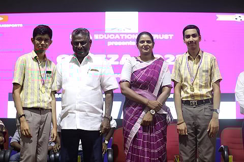 Olympian V Baksaran and former international athlete G Gayathry with Shyam Sundar Ramesh and Arjun A of PSBB (KK Nagar), champions of Quizza 2023, a mega inter-school sports quiz