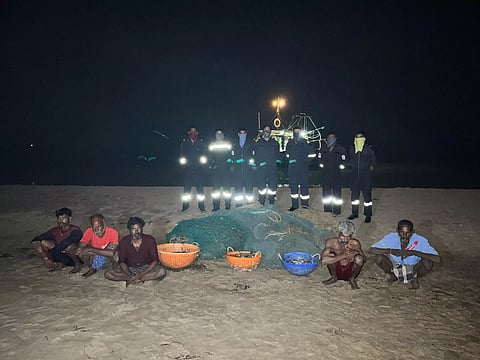 Arrested crew with seized sea cucumber