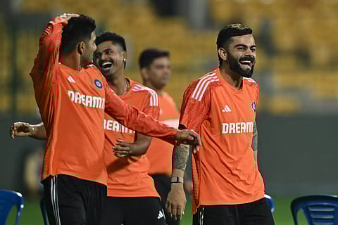 Virat Kohli is all smiles during a training session
