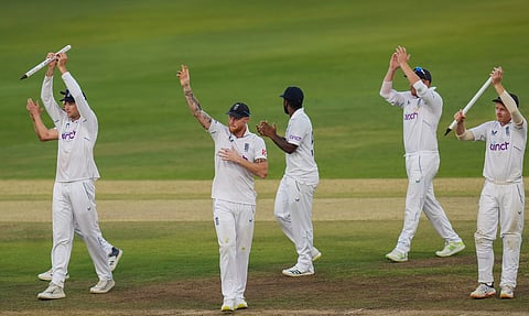 England players celebrate after winning the first Test against India at Hyderabad