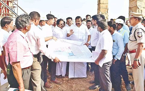 Minister KN Nehru inspecting the ongoing works for the integrated bus terminus in Tiruchy on Thursday.