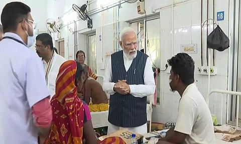 Prime Minister Narendra Modi meeting injured persons. (ANI)