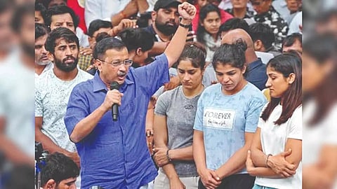 Delhi Chief Minister Arvind Kejriwal with the wrestlers 