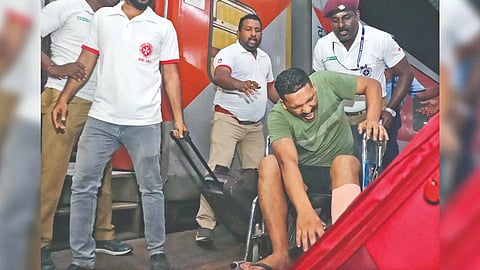 An injured victim being wheeled out by railway officials at MGR Central station in Chennai on Sunday (Photo: Hemanathan M)