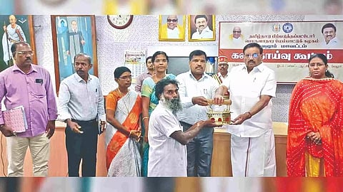 K Khaja Mohindeen, BCEDC chairman distributing welfare assistance in Vellore on Tuesday