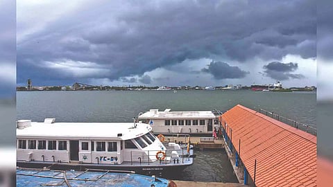 Dark clouds cover Kochi skyline Thursday