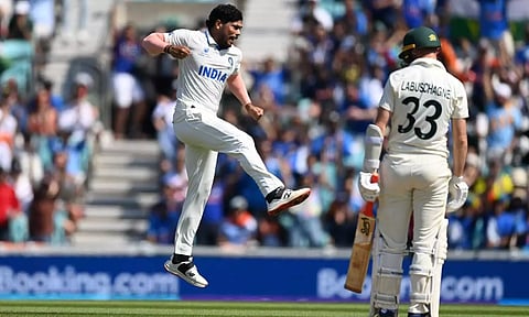 Umesh Yadav takes a wicket. (BCCI)