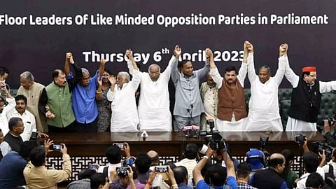 Floor leaders of like-minded Opposition parties join hands after addressing a joint press conference at the Constitution Club in New Delhi (ANI)