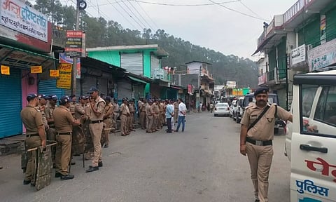 Security personnel deployed in Purola after the imposition of section 144 of the CrPC by district administration, in Uttarkashi district. (PTI)