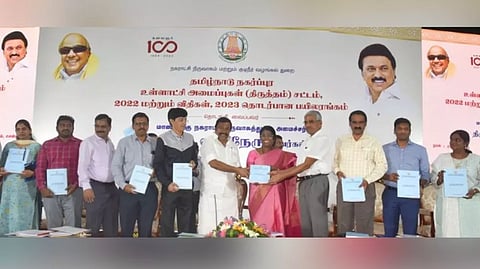 Minister K N Nehru instructed the officers working in urban local bodies to coordinate with the elected local body representatives