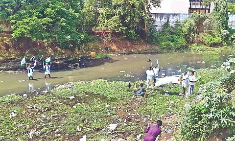 Farmers stage a protest in the Uyyakondan riverbed