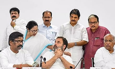 Party leaders interact during a joint press conference after opposition parties' meeting, in Patna. (Picture credit: PTI)