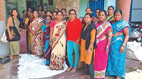 Surya Dinkar with her employees at the company