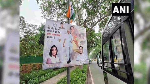 Posters outside Sharad Pawar's Delhi residence (Photo: ANI)