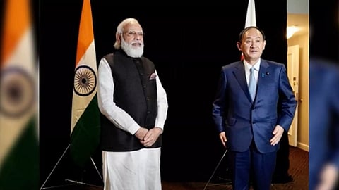 Prime Minister Narendra Modi with Yoshihide Suga (Photo: IANS)