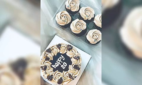 Chocolate bento cake with gift hampers (File)