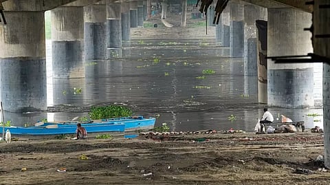 A boat anchored near the bank of Yamuna river, in New Delhi