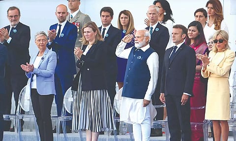 Prime Minister Narendra Modi with French President Emmanuel Macron, First Lady Brigitte Macron and others during Bastille Day Parade, in Paris, on Friday