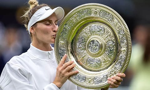 Czech Republic's Marketa Vondrousova celebrates with the trophy (Reuters)