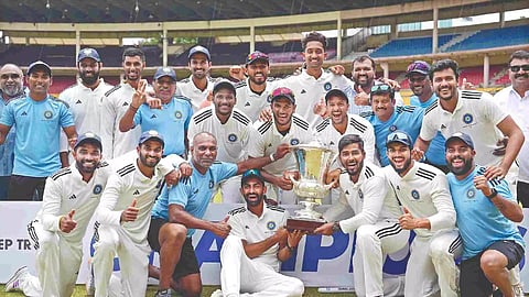 South Zone players pose with the trophy after defeating West Zone in the final of Duleep Trophy on Sunday