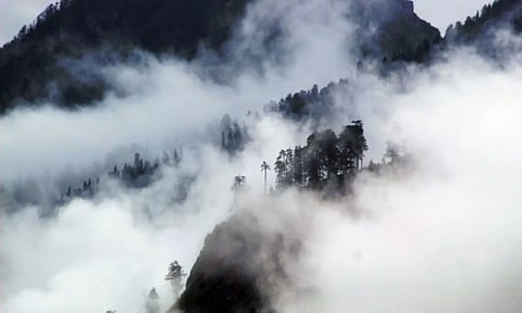 Clouds cover the hills of Kullu as the IMD issued an orange alert in several districts of Himachal Pradesh. (Photo: ANI)