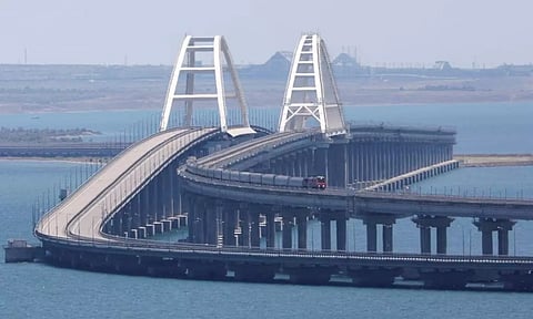 A train moves along the Crimean Bridge,