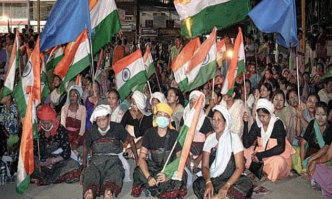 Women participate in sit-in protest demanding restoration of peace in Manipur following the ongoing ethnic violence in the state, in Imphal on Tuesday. (ANI)