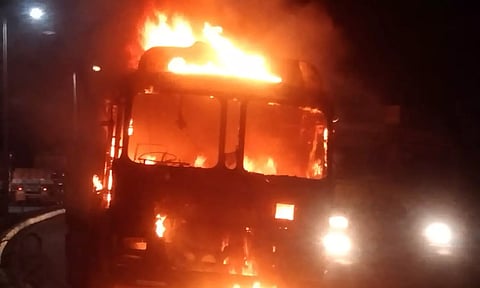 Truck catches fire on NH16 in Visakhapatnam (ANI)