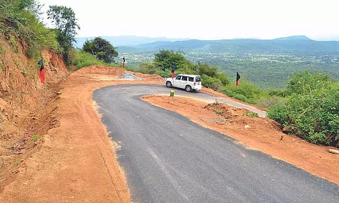 The newly-laid tar road from Muthukumaran Malai to Peenjamandai tribal village in Vellore