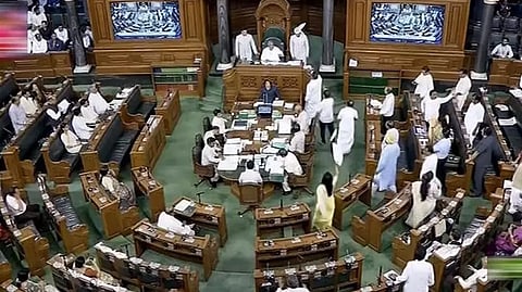 Opposition MPs protest in the Lok Sabha during the Monsoon session of Parliament