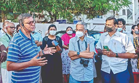 Kombai S Anwar (extreme left in blue shirt) curating a walk