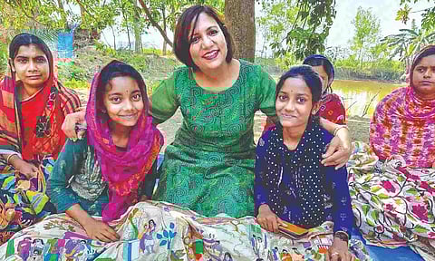 Farah Khan (in green top) with artisans