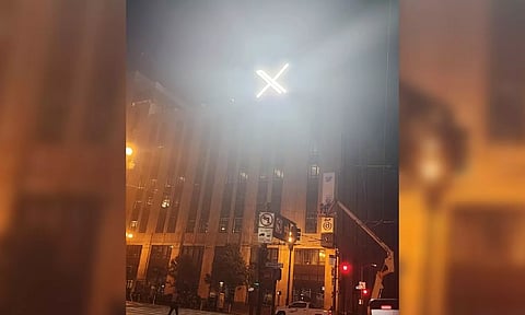 'X' logo is seen on the top of the headquarters of the messaging platform X