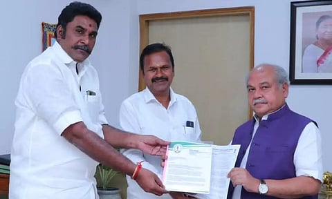 R Ilango handing over a petition to Union Agri Minister Narendra Singh Tomar in Delhi on Thursday