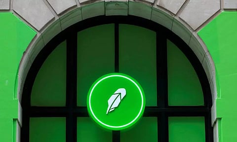 The logo of Robinhood Markets, Inc. is seen at a pop-up event on Wall Street after the company's IPO in New York City (Reuters)