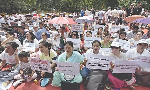 Meitei community people at a protest organised by Delhi Meitei Coordinating Committee, at Jantar Mantar.
