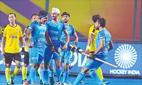 Karthi Selvam celebrates after scoring India’s first goal.