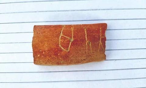 An artefact unearthed at Vadakkupattu excavation site in Kancheepuram.