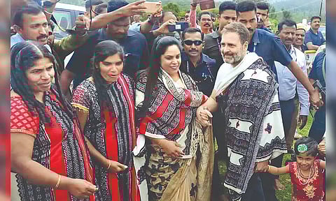 Rahul Gandhi with the members of Toda community on Saturday.